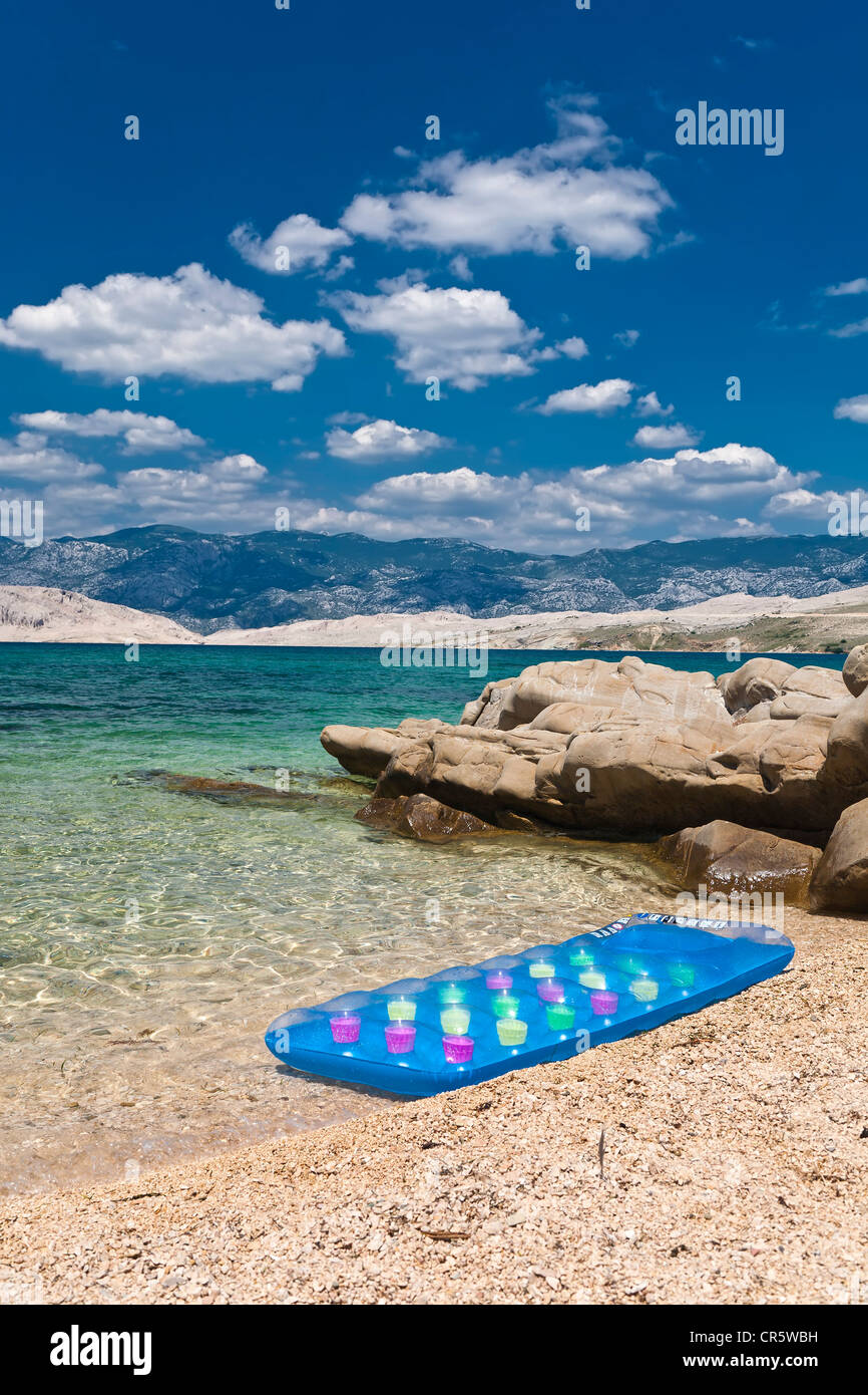 Air mattress in a secluded bay on Pag Island, Zadar, Dalmatia, Croatia, Europe Stock Photo