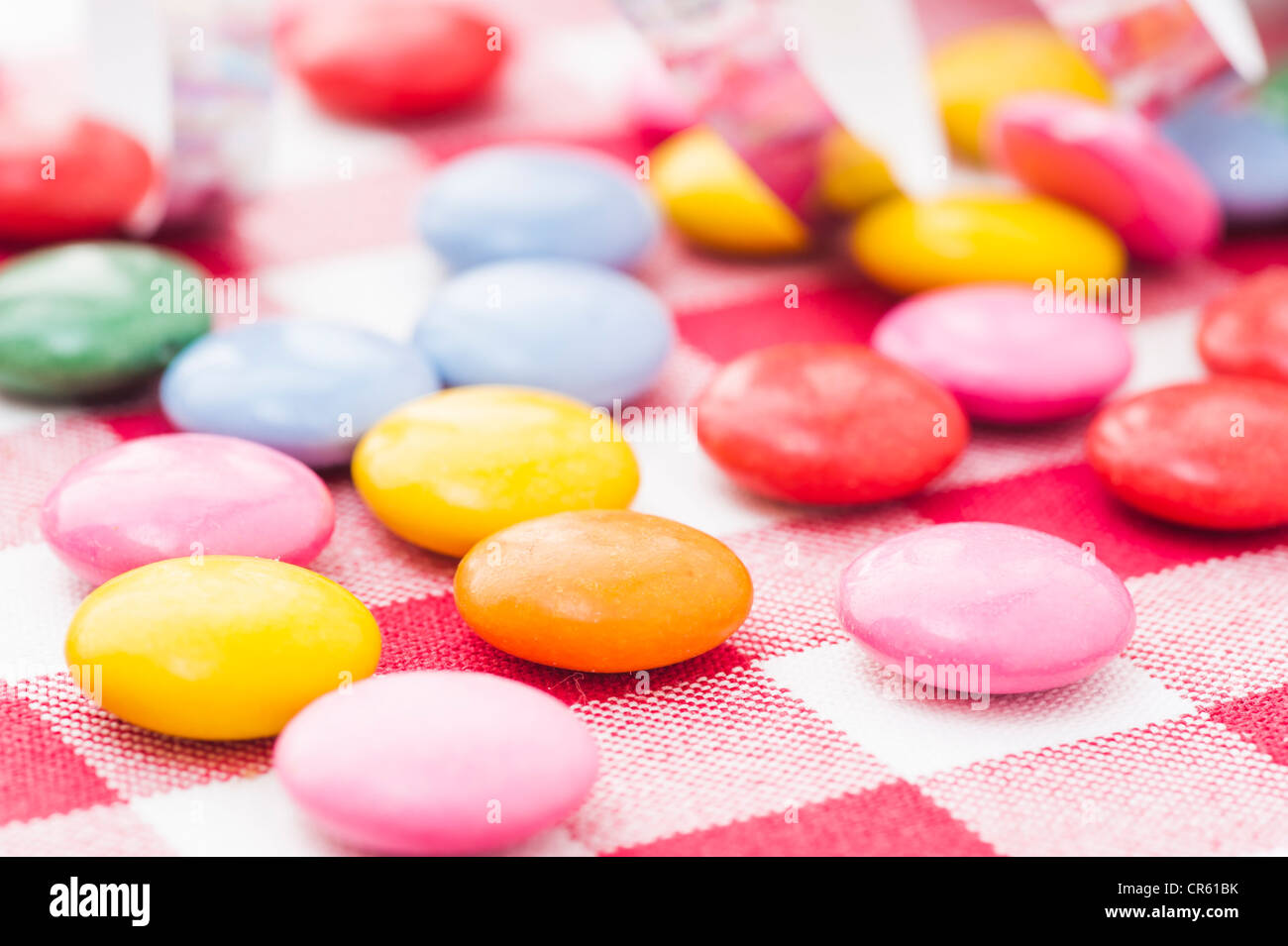 Close up of multicolored candy with streamer Stock Photo