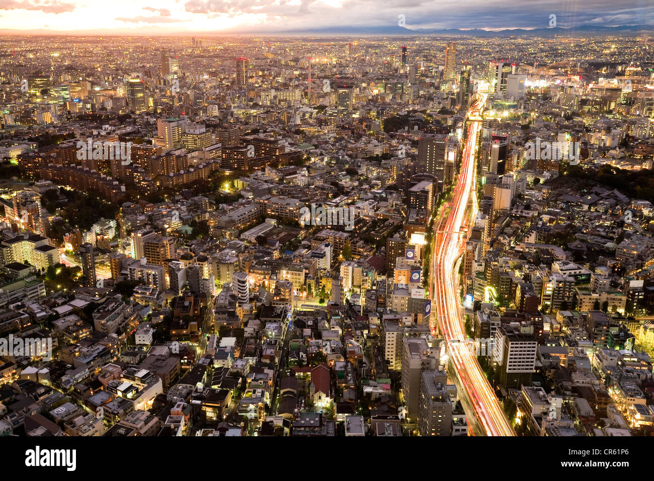 Japan, Honshu Island, Tokyo, Roppongi Hills, view from the Tokyo City View on the city center at dusk Stock Photo