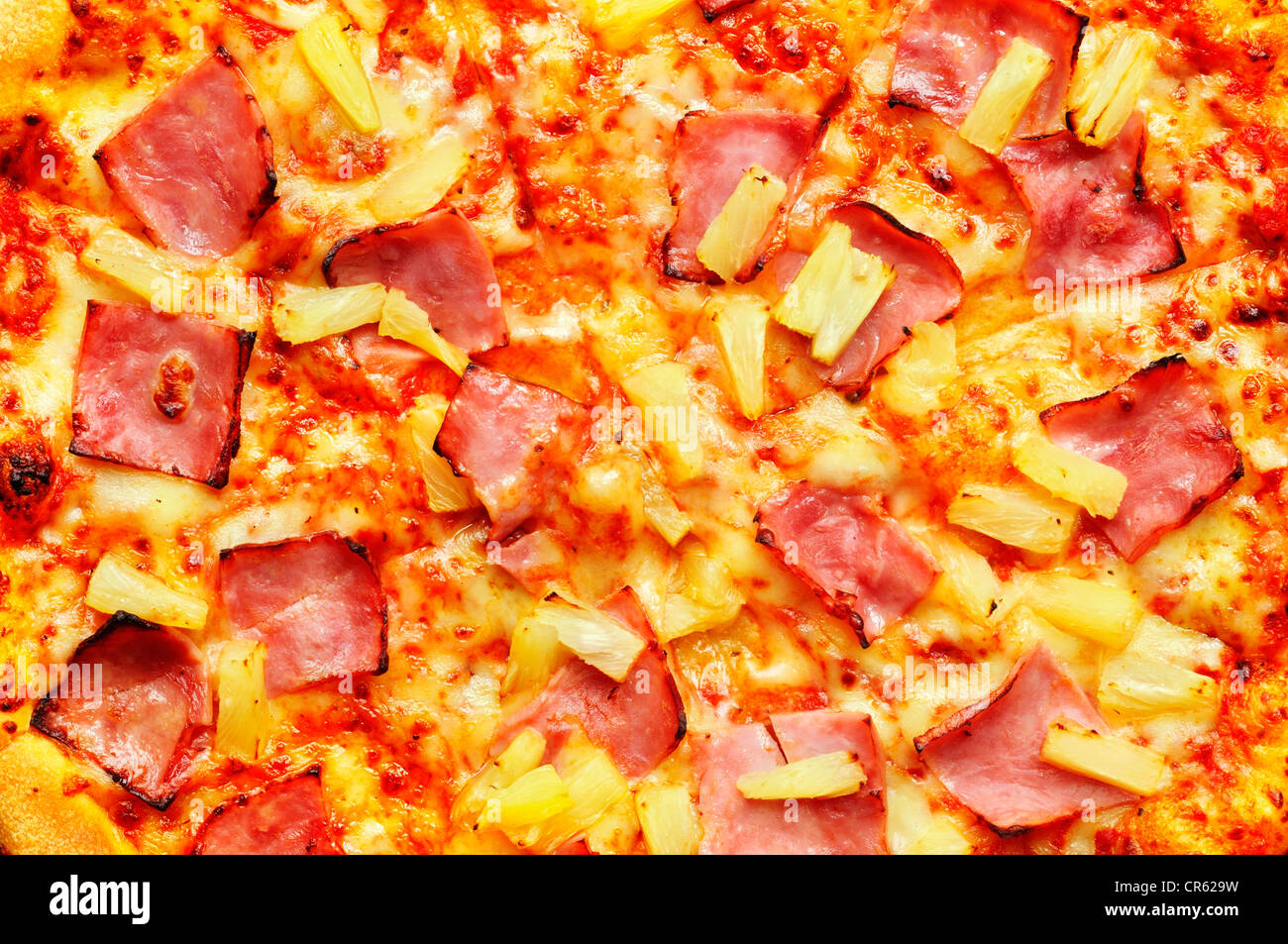 Hawaiian pizza / Ham and pineapple pizza Stock Photo