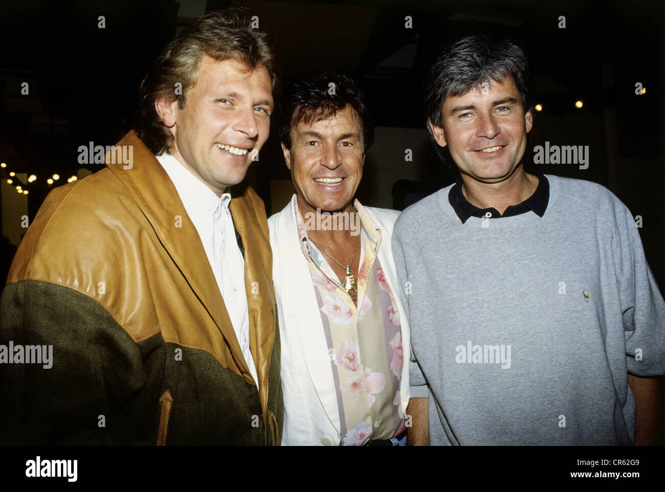 Meisner, Frederic, * 25.5.1953, German presenter, half length with Benny Schnier and Freddy Breck, at Hippodrom, Oktoberfest, München, 20.9.1993, Stock Photo
