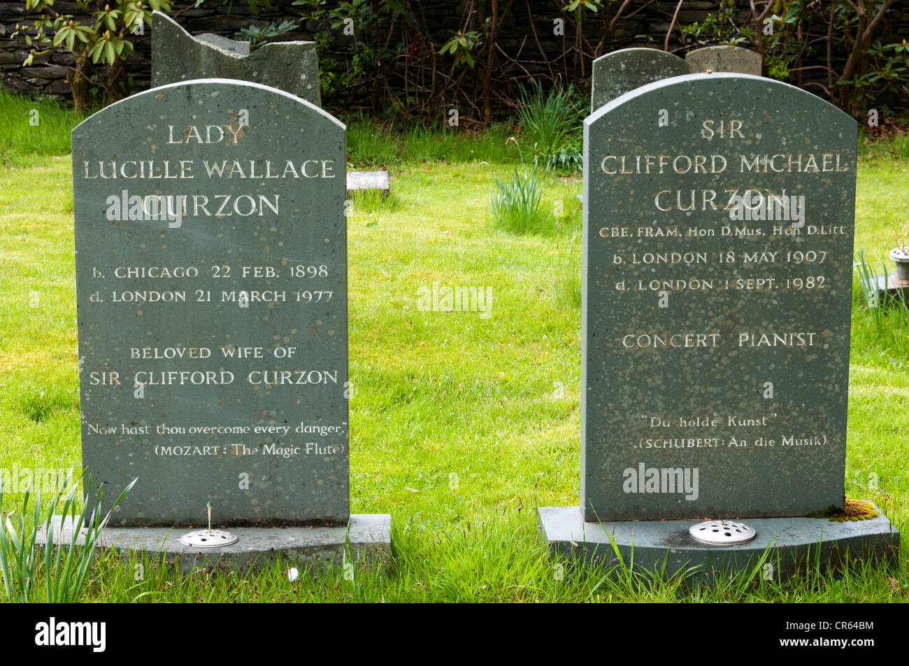 The graves of the concert pianist, Sir Clifford Michael Curzon and wife  in the churchyard of St Patrick's church, Patterdale. Stock Photo