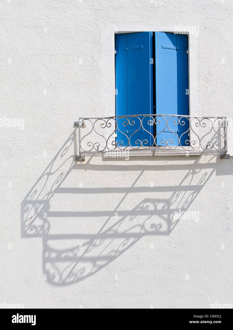 Balcony railing casting a shadow on a wall, Burano, Venice, Italy, Europe Stock Photo