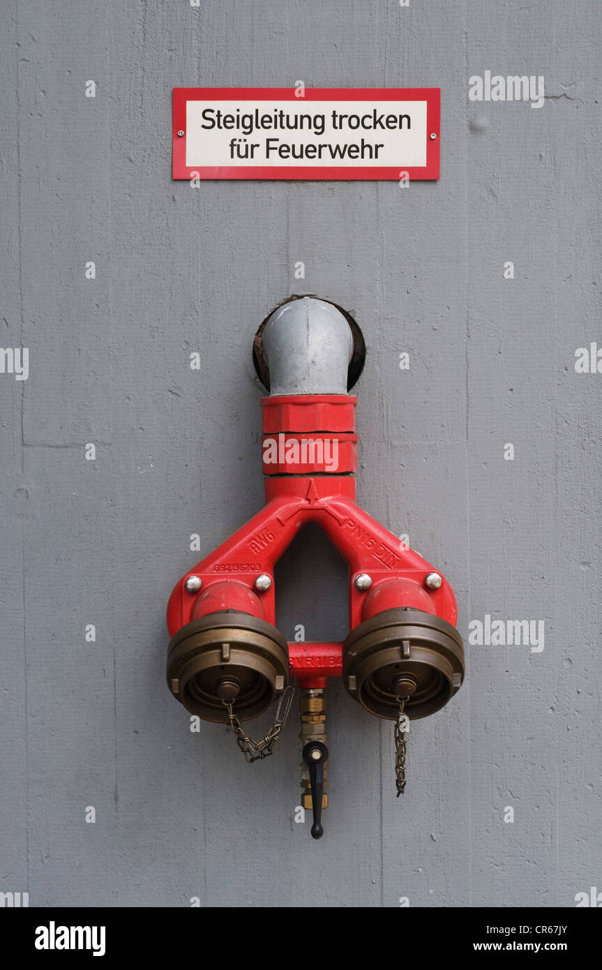 Fire protection, sign 'Steigleitung trocken fuer Feuerwehr', German for 'ascending pipe dry for fire brigade' Stock Photo
