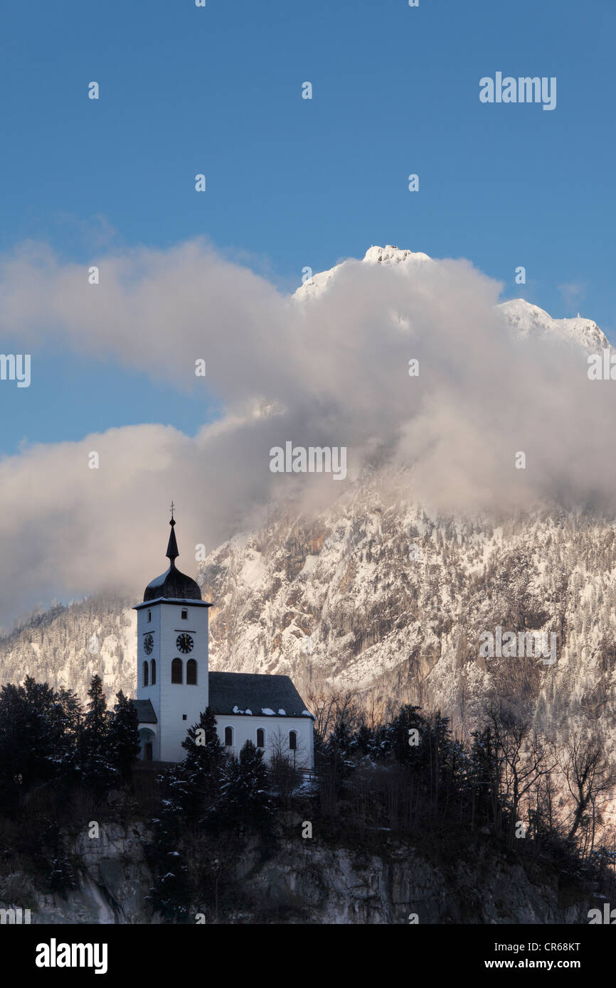 Austria, Upper Austria, View of church, Traunstein Mountain in background Stock Photo