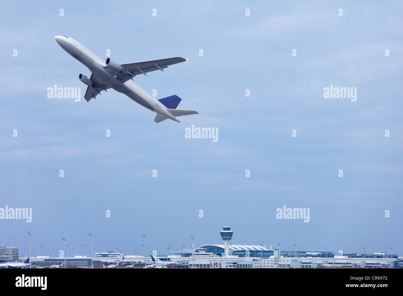 Europe, Germany, Bavaria, Commercial passenger air plane taking off at Munich airport Stock Photo