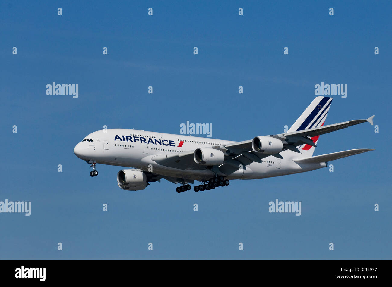Air France passenger plane in flight with extended landing gear, Airbus A 380 super jumbo Stock Photo