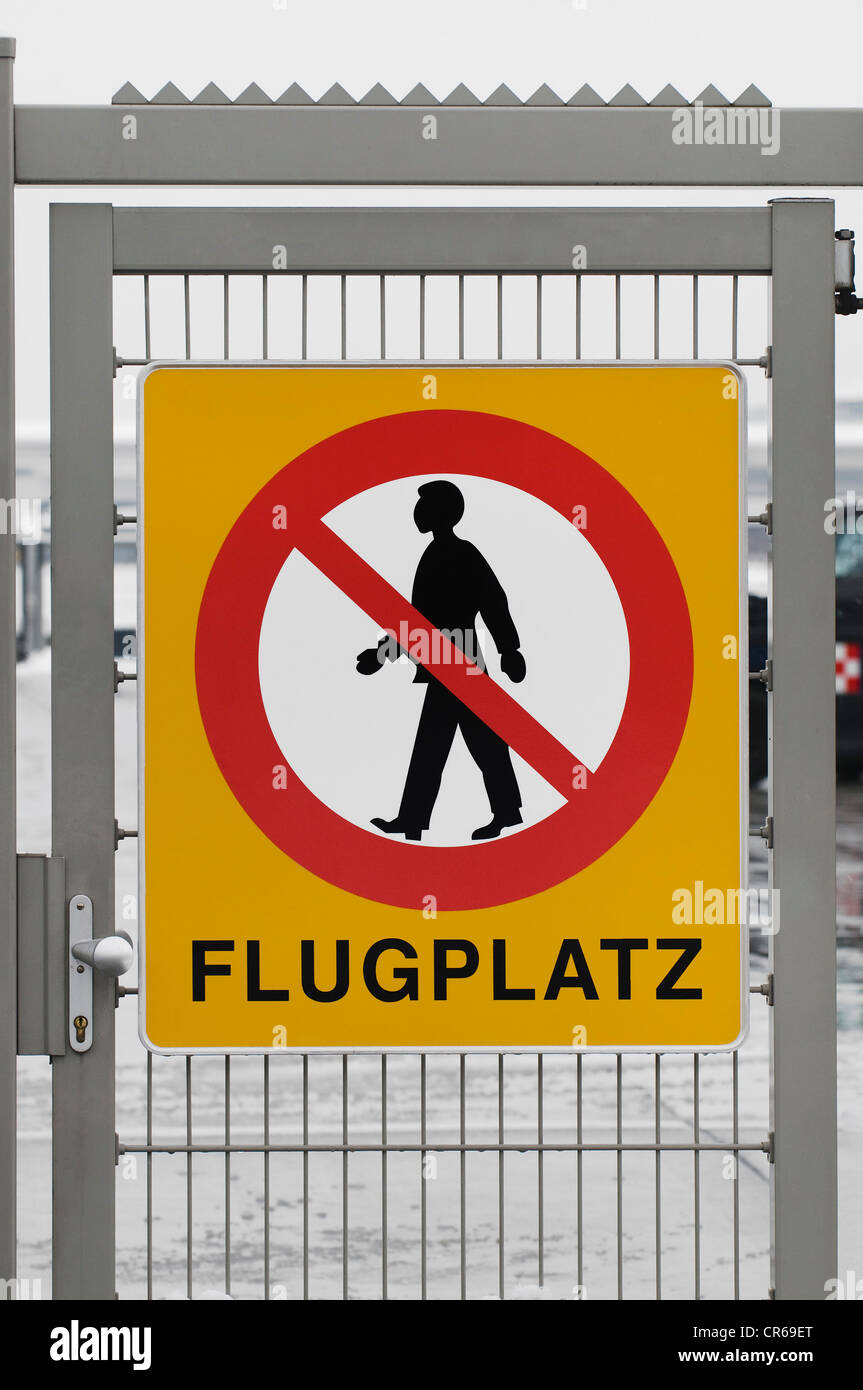 Sign on a wire door at an airport, pictogram, no pedestrian access Stock Photo