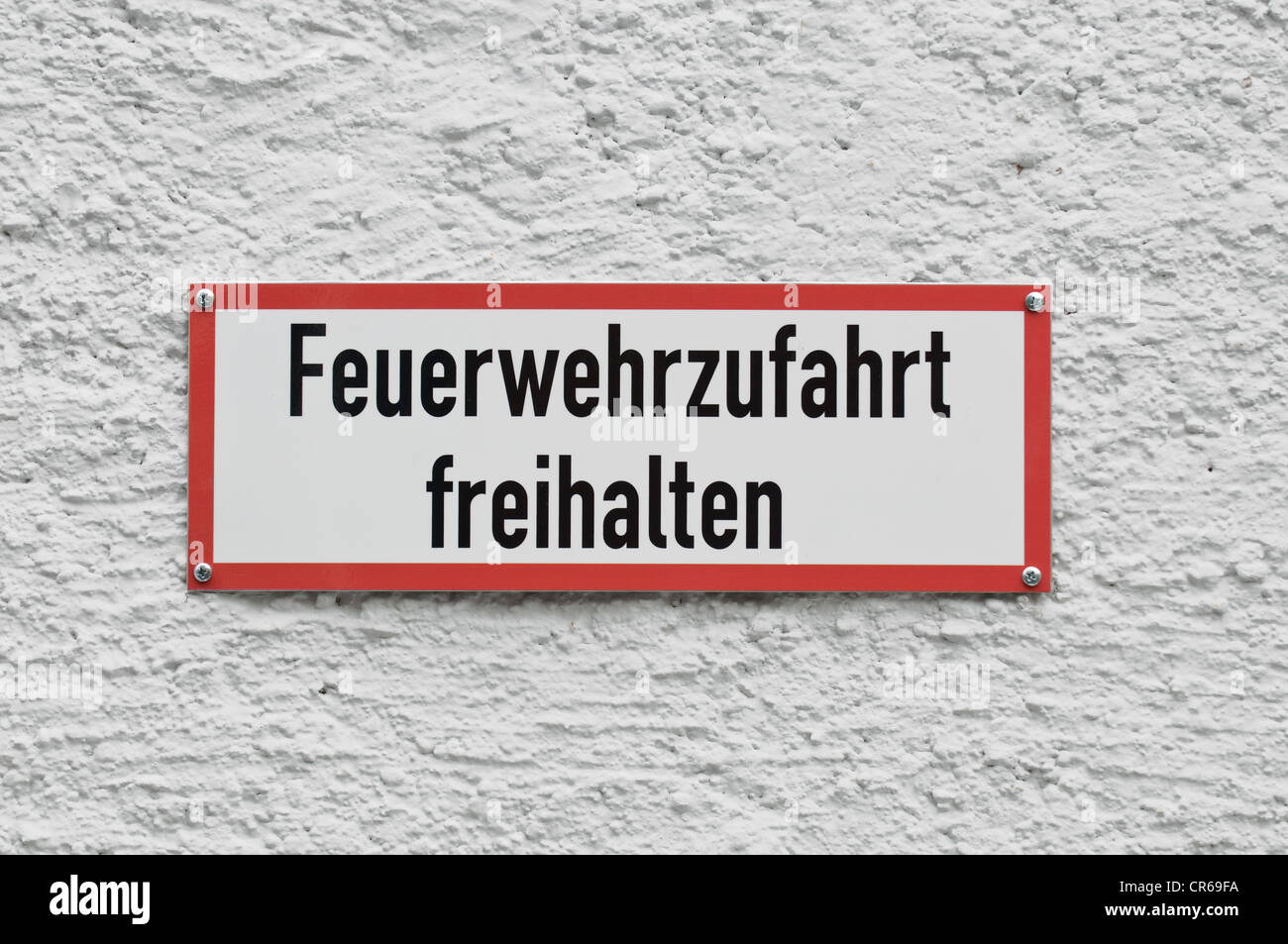 Sign, Feuerwehrzufahrt freihalten, German for keep clear for fire services Stock Photo