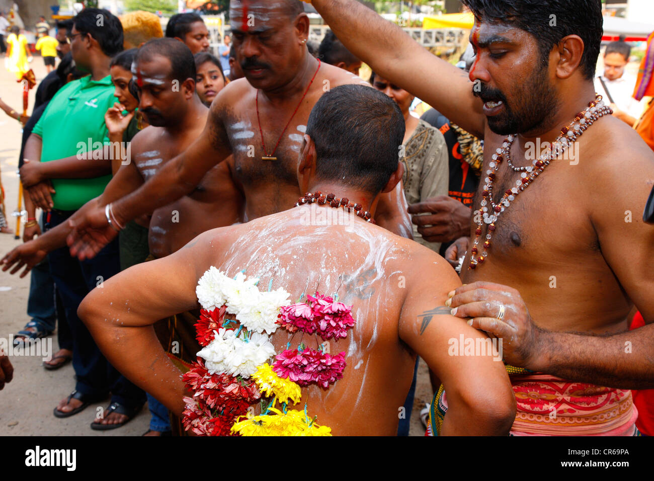 Pilgrim with spiritual piercing, Hindu festival Thaipusam, Batu Caves limestone caves and temples, Kuala Lumpur, Malaysia Stock Photo