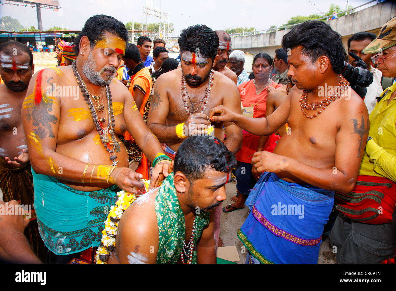 Pilgrim with spiritual piercings, Hindu festival Thaipusam, Batu Caves limestone caves and temples, Kuala Lumpur, Malaysia Stock Photo