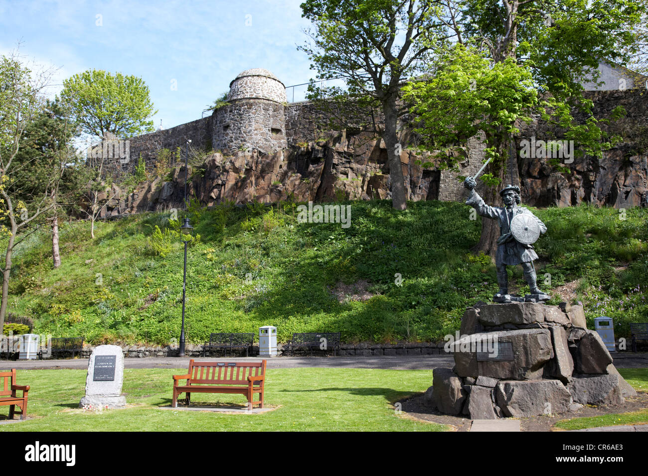 garden of remembrance and rob roy statue in front of the old town wall