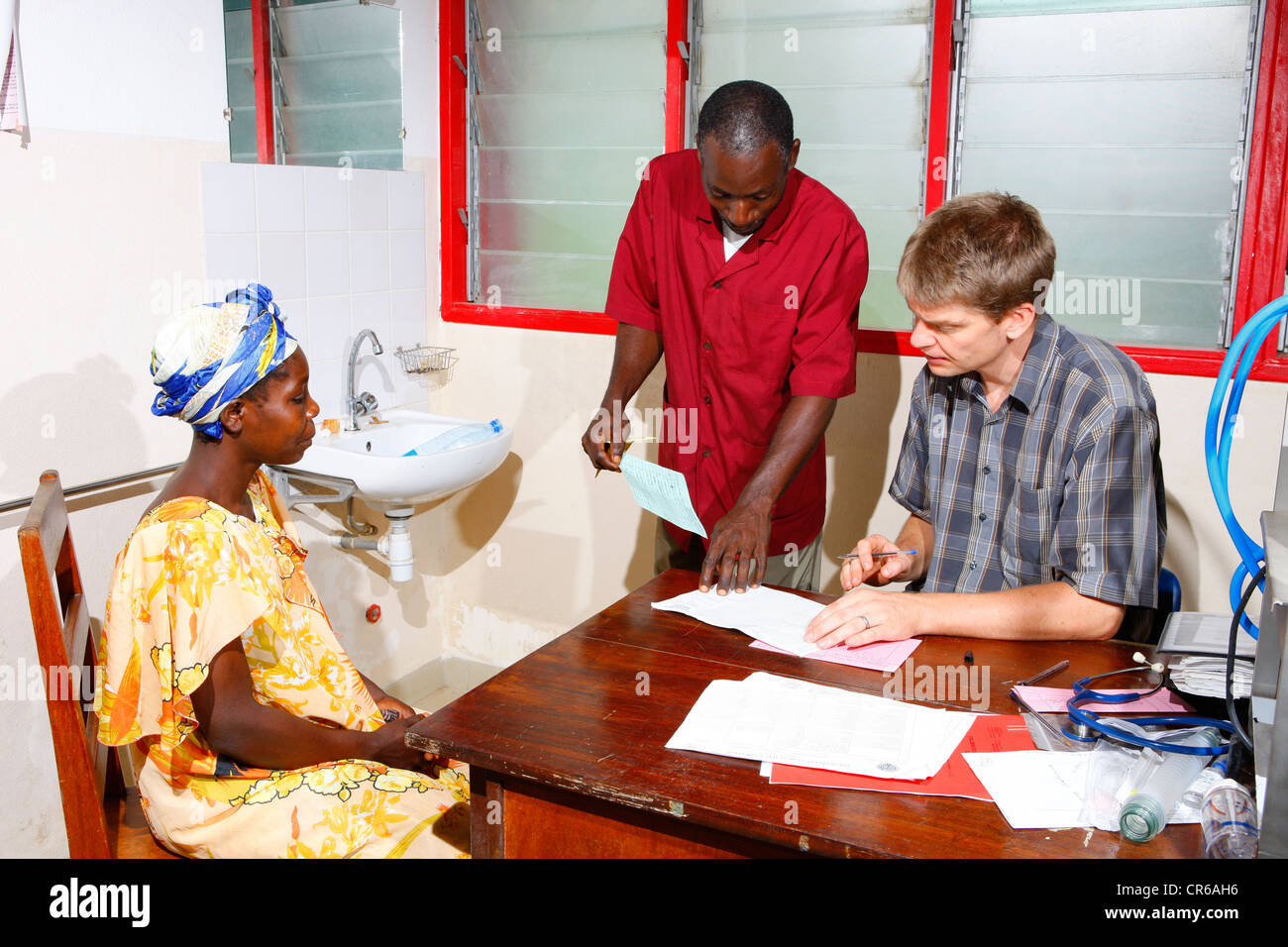Patient and doctor, consultation, hospital, Manyemen, Cameroon, Africa Stock Photo