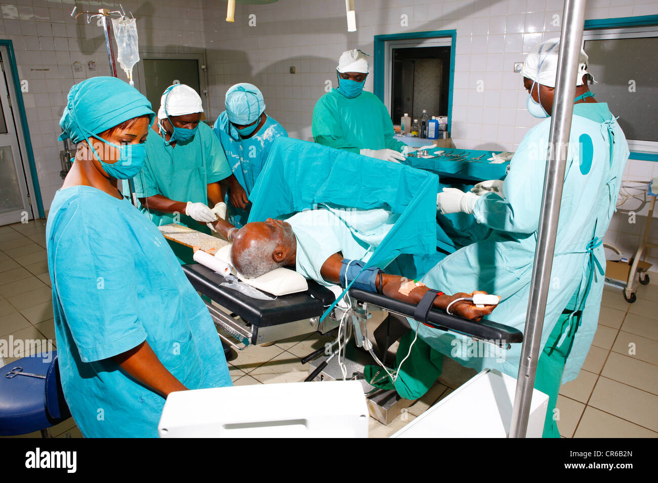 Man during an operation in a hospital, Manyemen, Cameroon, Africa Stock Photo