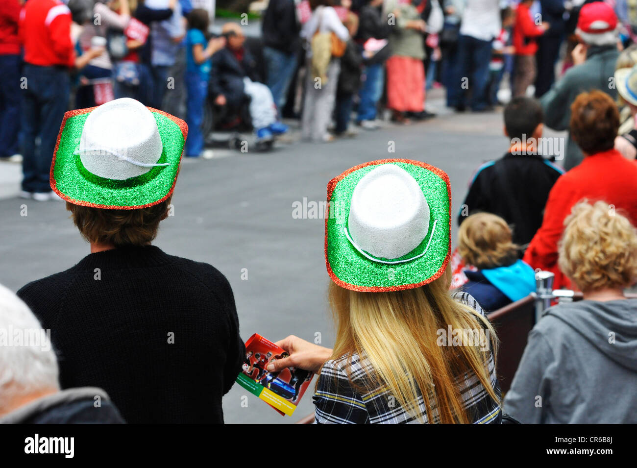 People wearing green hats hi-res stock photography and images - Alamy