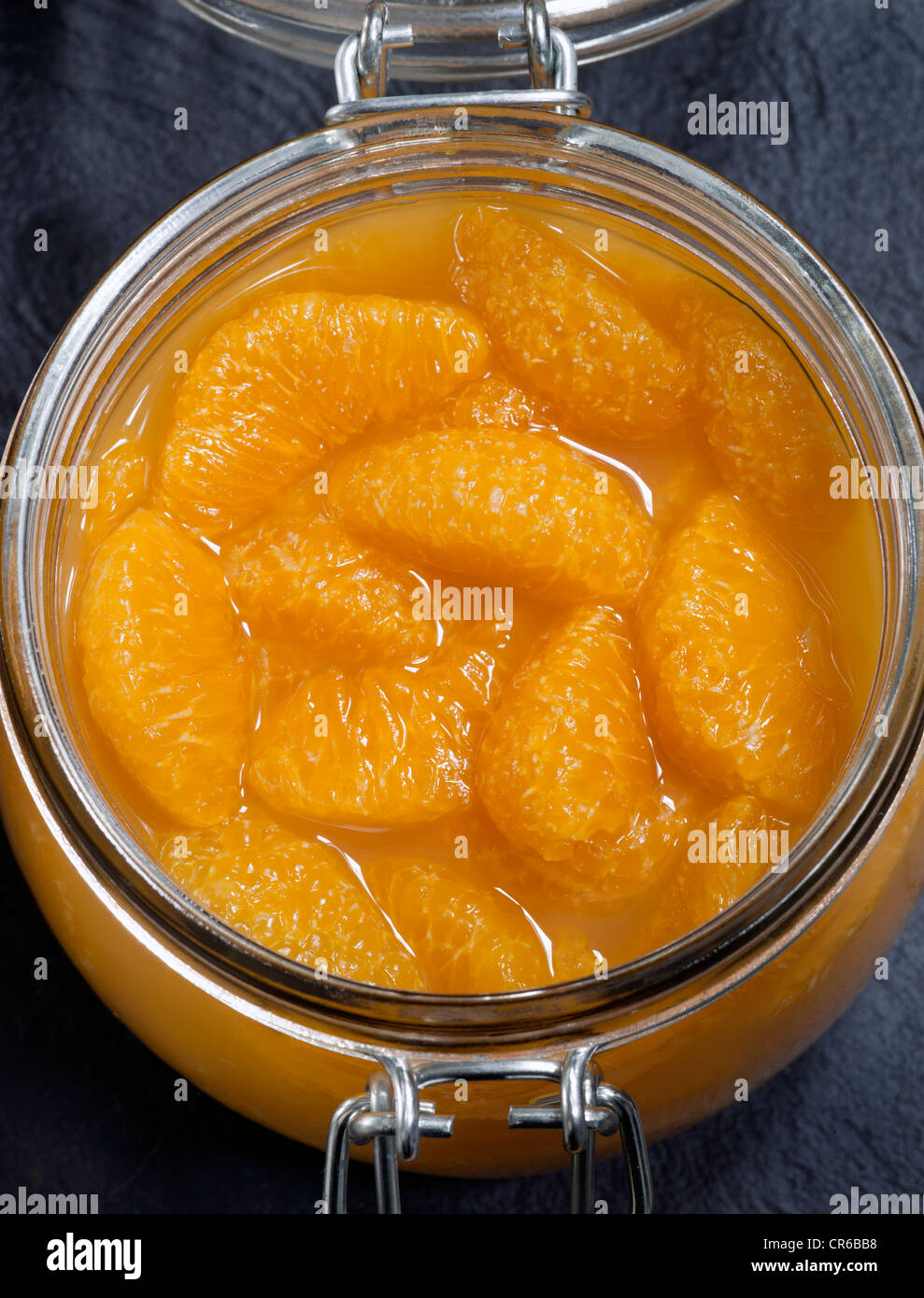 Mandarin Orange Segments in Glass Storage Jar Stock Photo