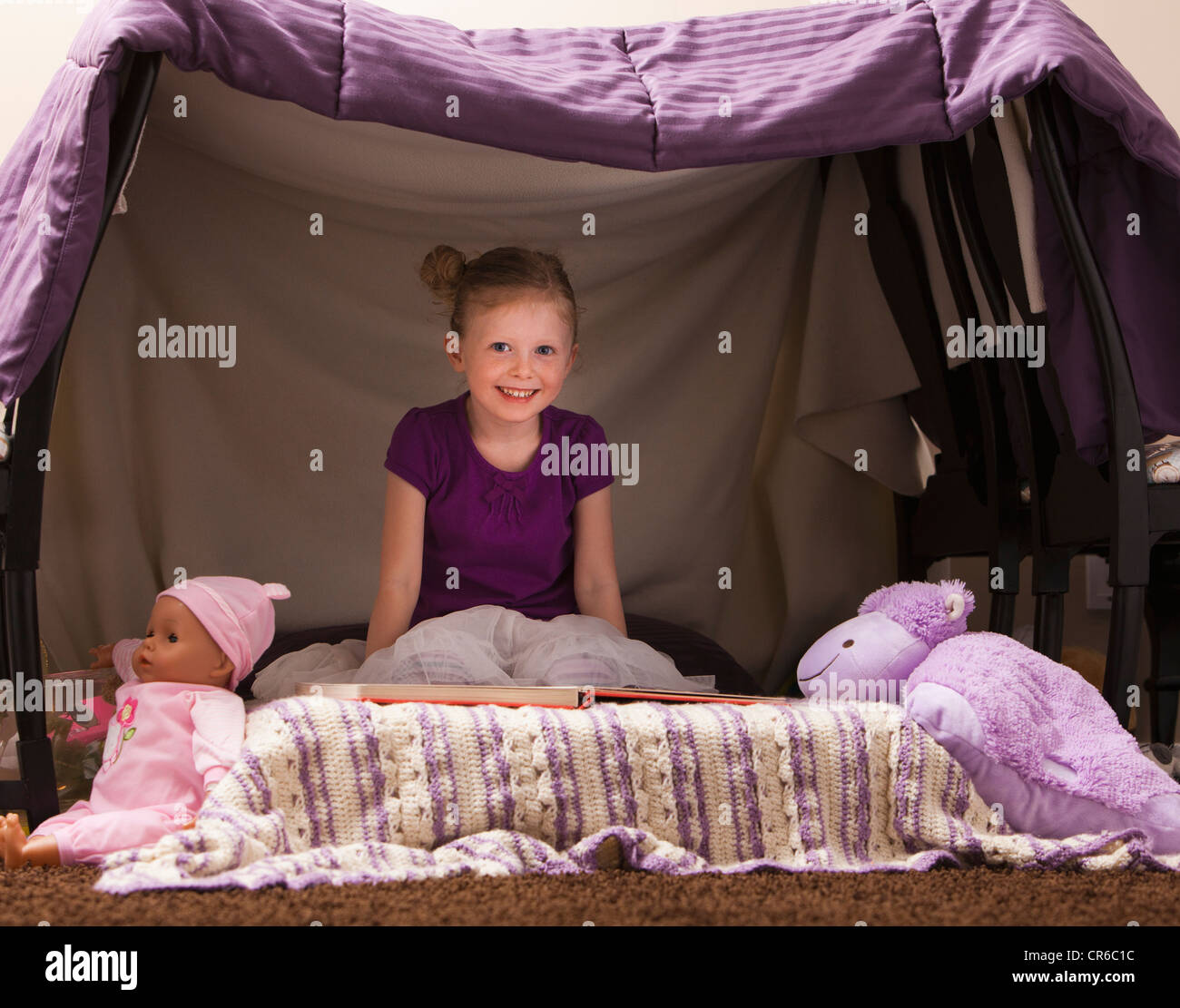 Portrait of happy girl (45) in playhouse Stock Photo Alamy