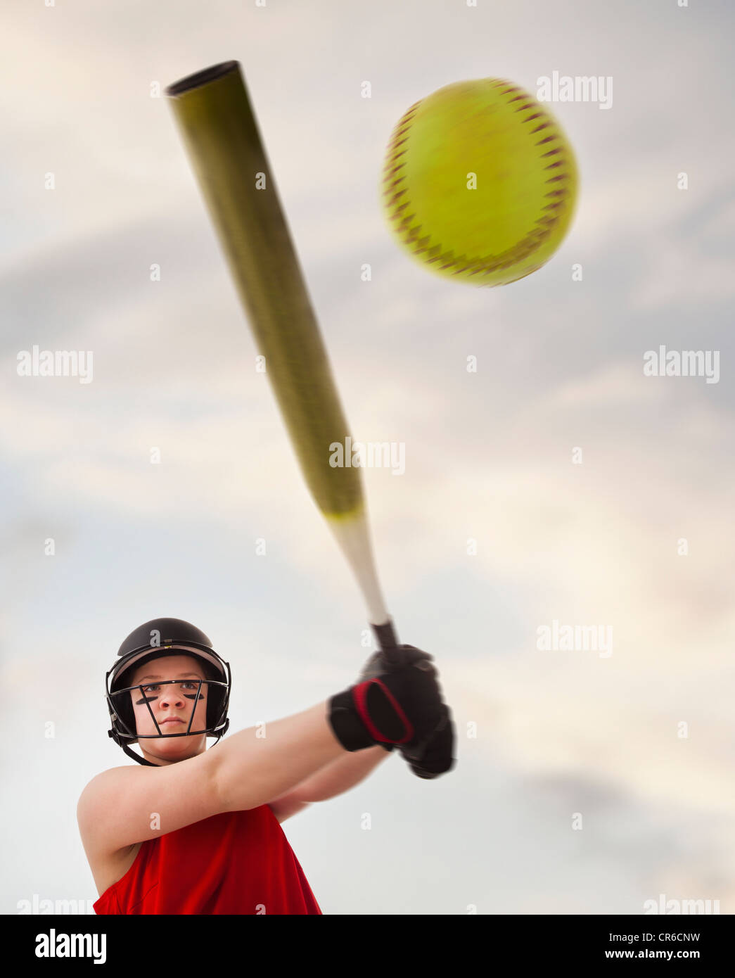 Girl (12-13) plying softball Stock Photo