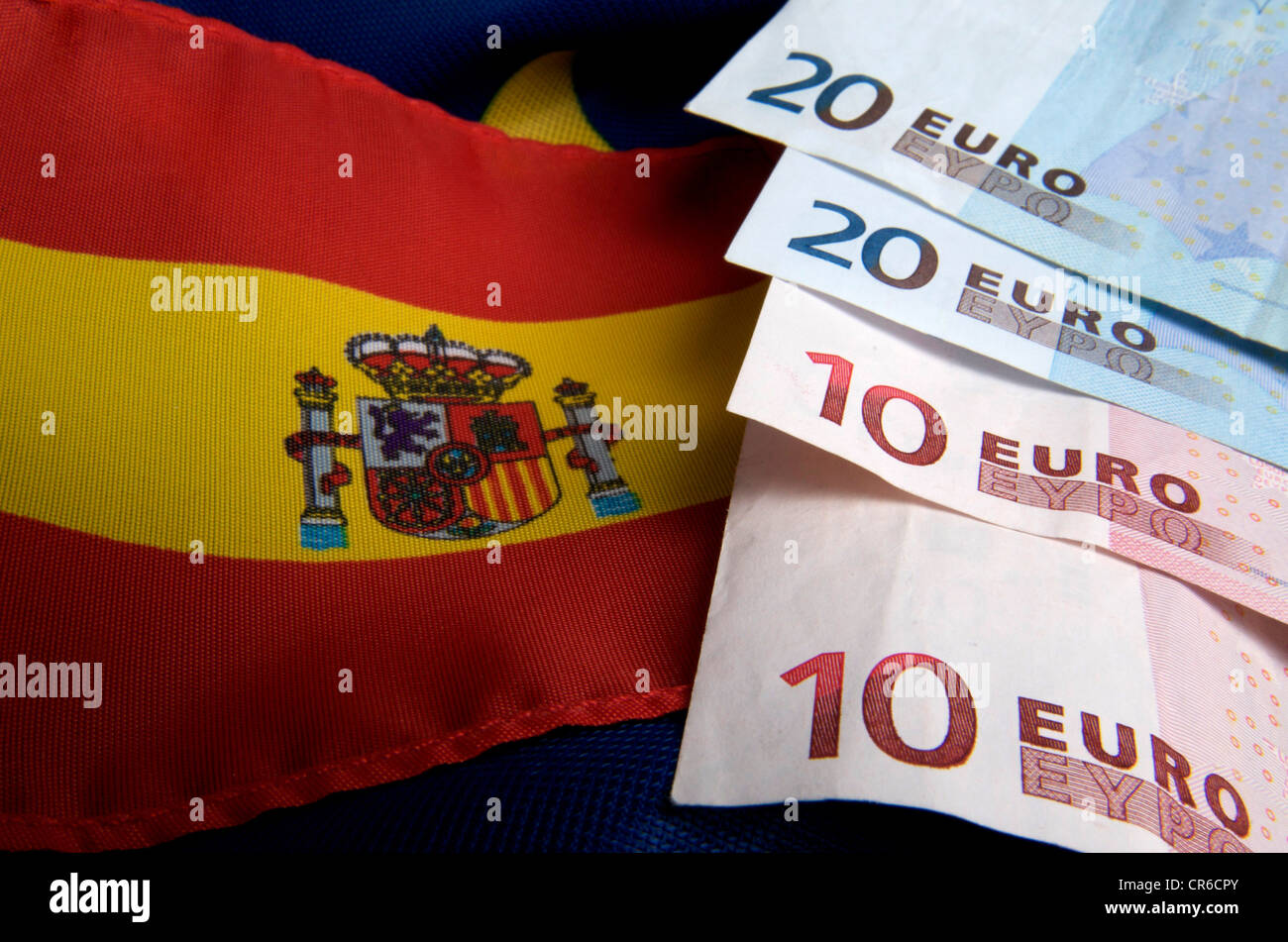 Spanish and EU flag and euro banknotes Stock Photo
