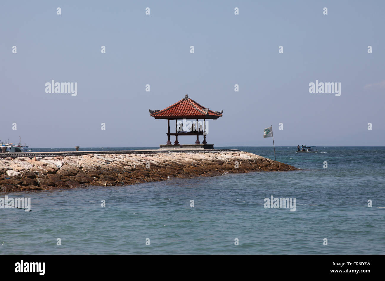 This is a photo of Bali in Indonesia. It's a touristic place with nice beach and sand very Zen with palm tree, coco tree, temple Stock Photo