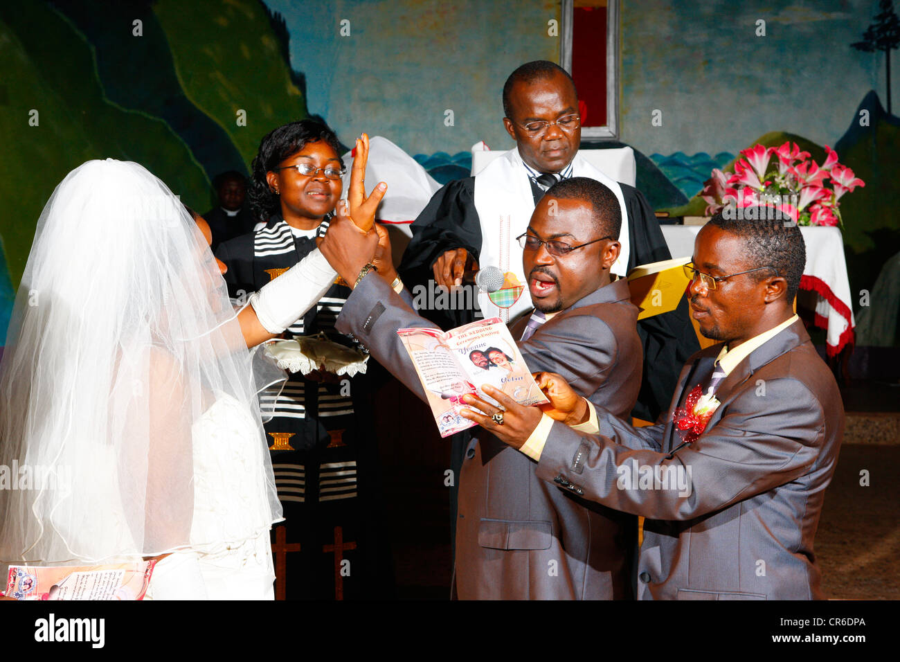 Bride and groom taking their wedding vows, Bamenda, Cameroon, Africa Stock Photo