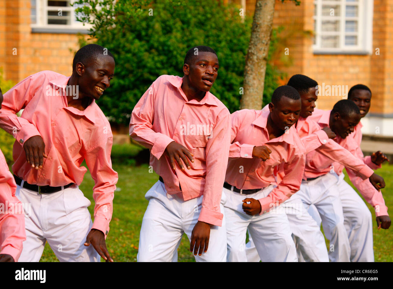 Men of a church choir singing and dancing Bukoba, Kagera region, Tanzania, Africa Stock Photo