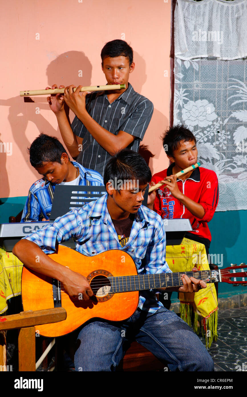 Students making music, boarding school, Simalungun, Sumatra, Indonesia