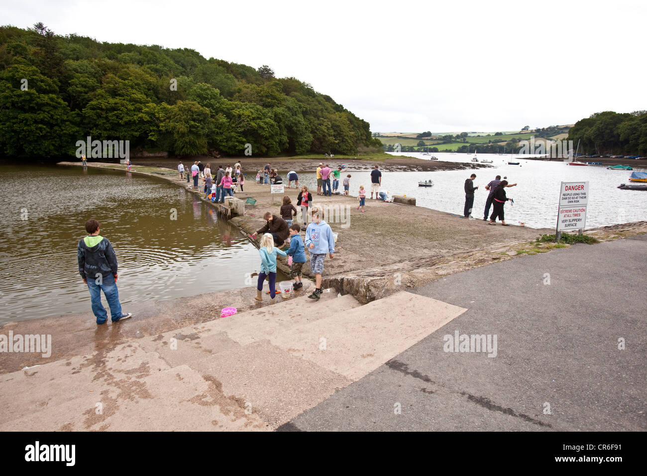 Fishing for crabs at Stoke Gabriel, Devon, England, United Kingdom