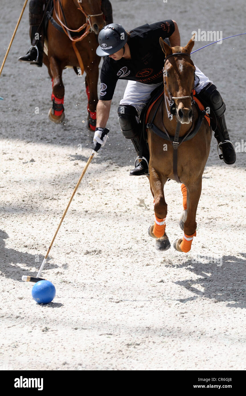 Santos Anca hits the ball, Sheraton Muenchen Airport Hotel Polo Team, Airport Arena Polo Event 2010, Munich, Upper Bavaria Stock Photo