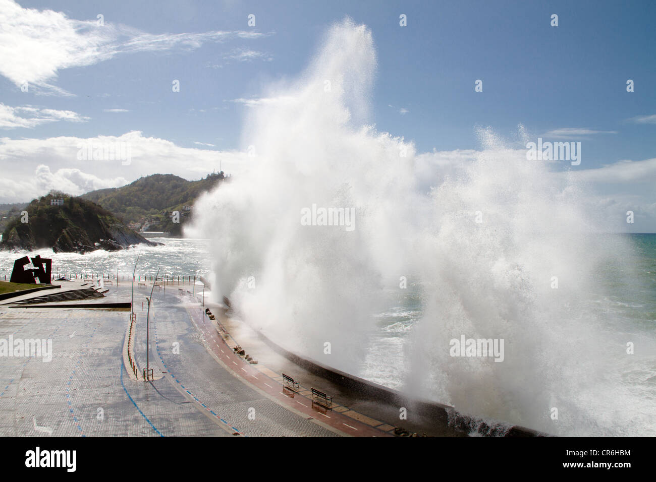 Big wave hits the coast at San Sebastian in the Basque country Stock Photo