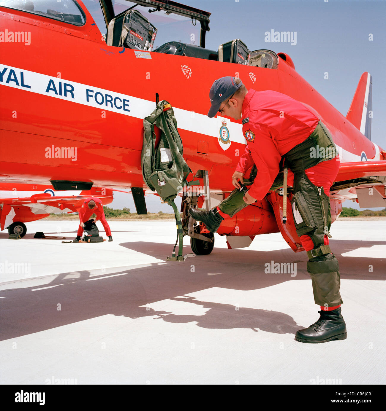 Flight Lieutenant Dan Simmons of the 'Red Arrows', Britain's prestigious Royal Air Force aerobatic team, zips up his g-pants. Stock Photo