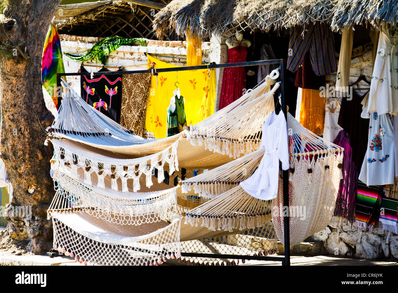 Hammock and clothing display in outdoor shop in 'Todos Santos Baja Mexico Stock Photo