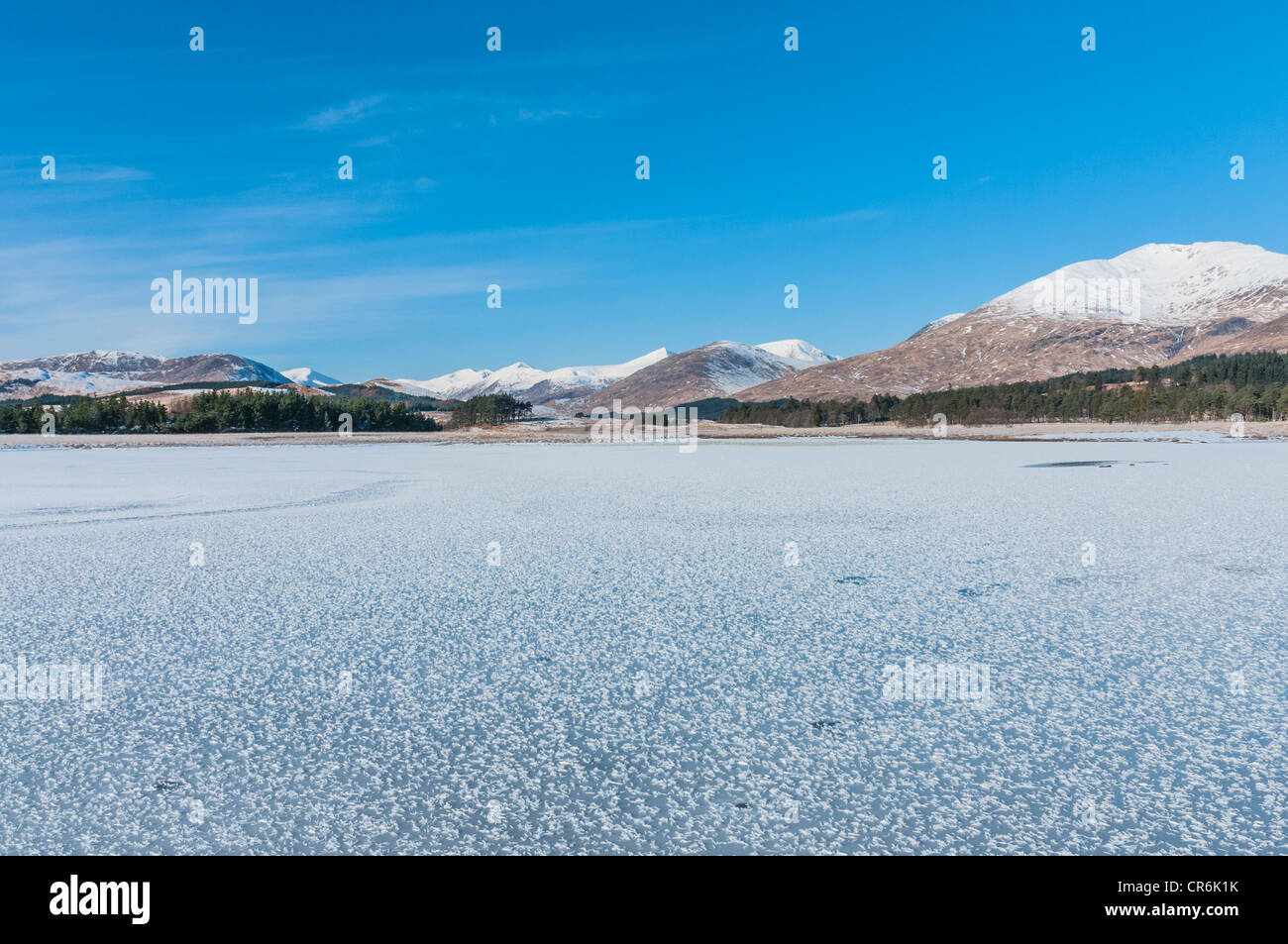 Snow covered Loch Tulla Bridge of Orchy Argyll & Bute Scotland looking up to Black Mount Stock Photo