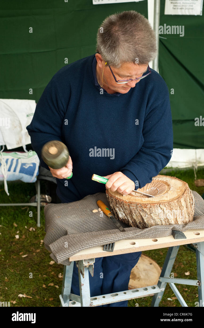 Cornwall, UK Woman carving wood Stock Photo Alamy