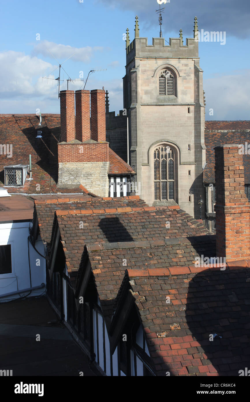 Over looking Tudor roof tops towards Guild Chapel church. Stratford upon Avon Stock Photo