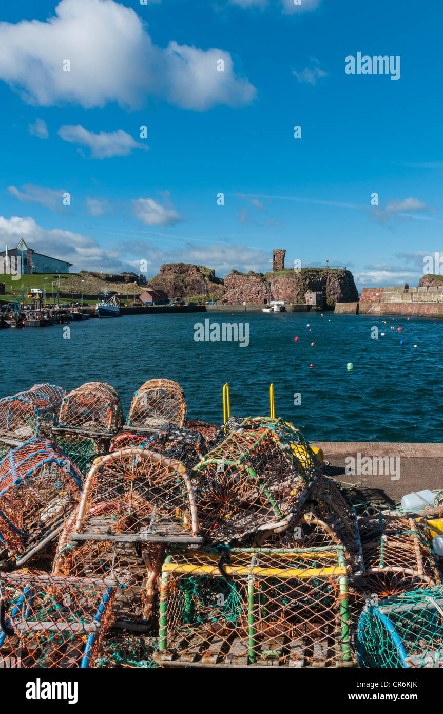 Fishing Boats In Dunbar Harbour & Lobster Pots With Castle Dunbar East ...