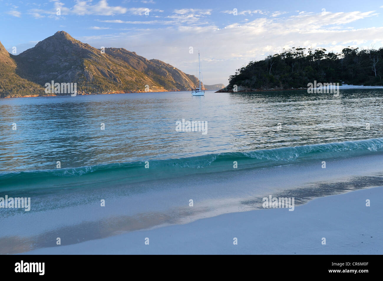 Wineglass Bay with a cruising yacht at anchor. Tasmania, Australia