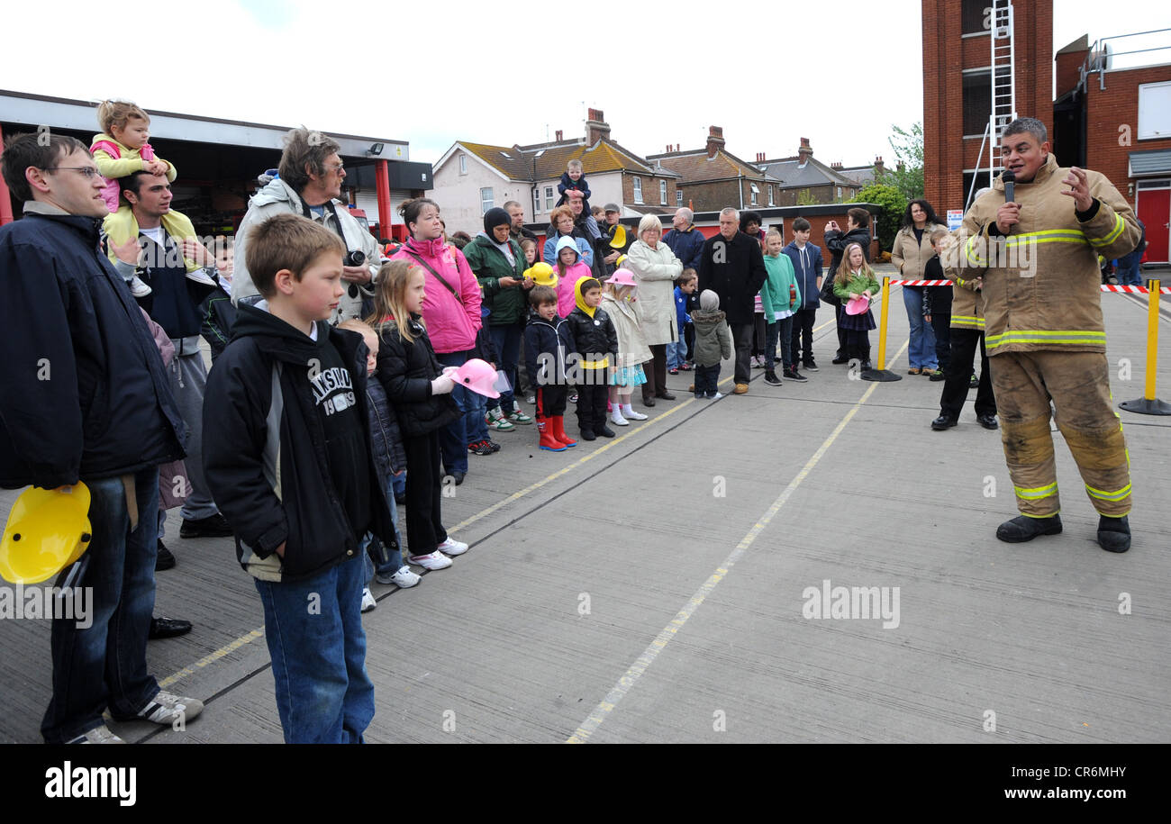 Crowds gather for a chip pan fire demonstration by East Sussex Fire and
