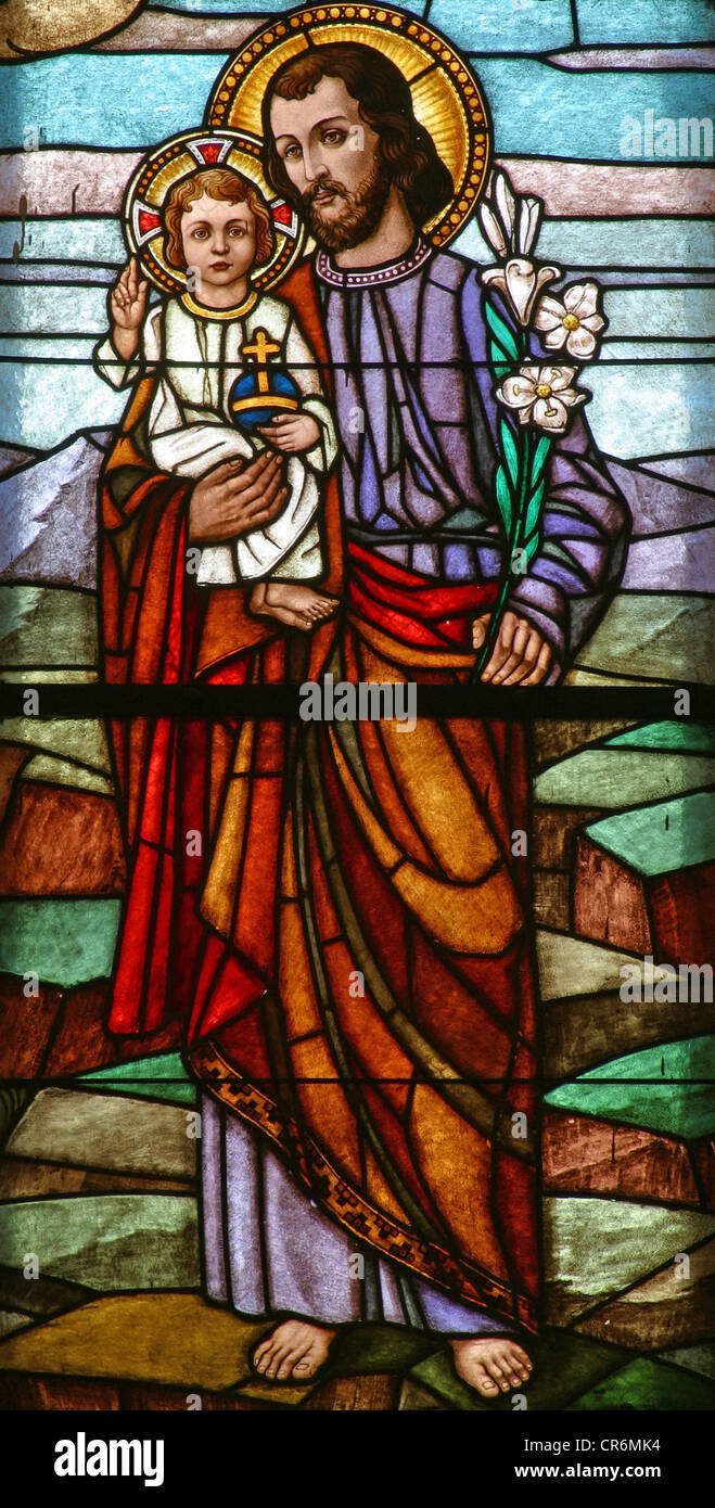 Saint Joseph holding baby Jesus Stock Photo - Alamy