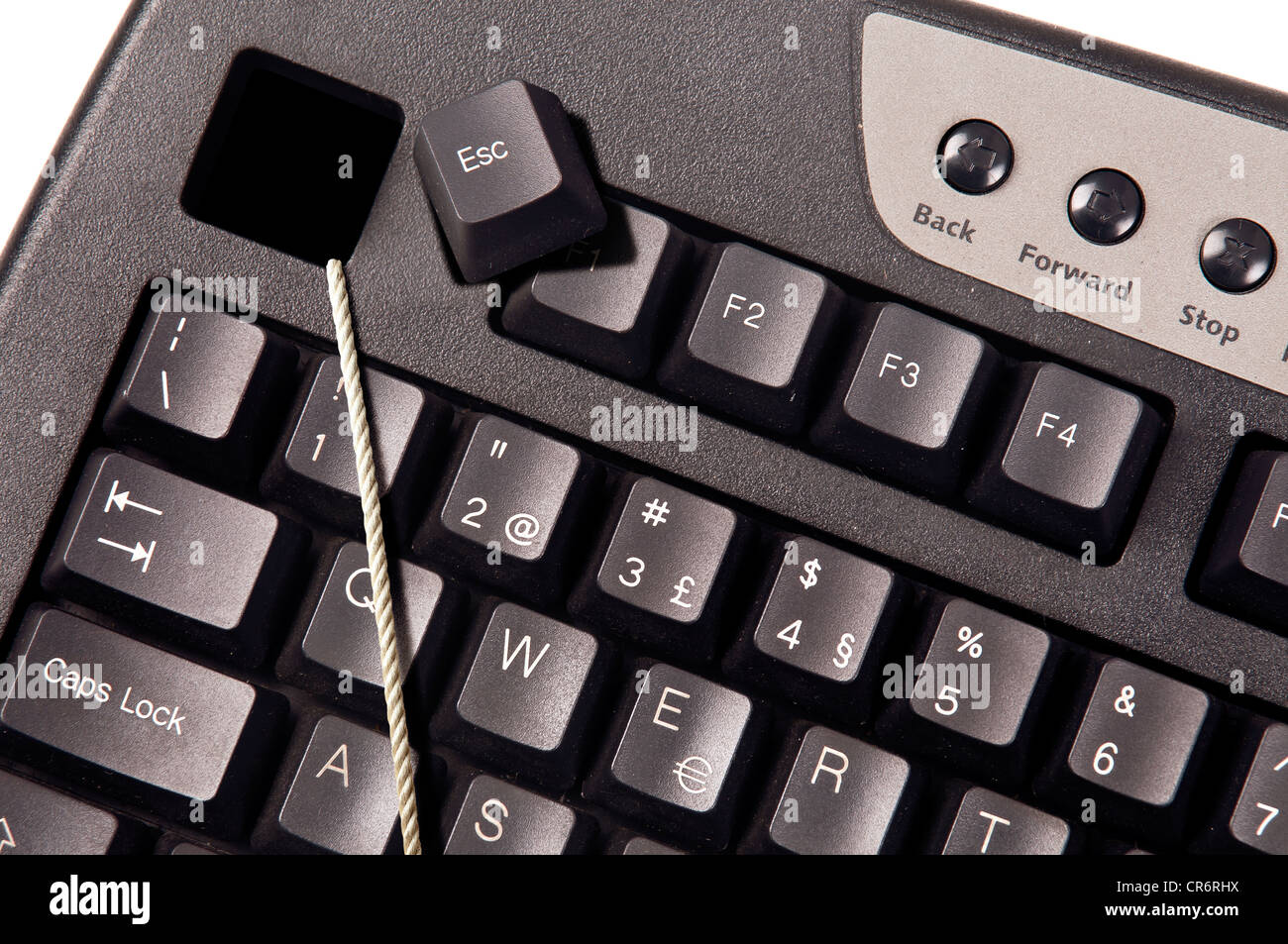 Computer keyboard with escape key and rope Stock Photo