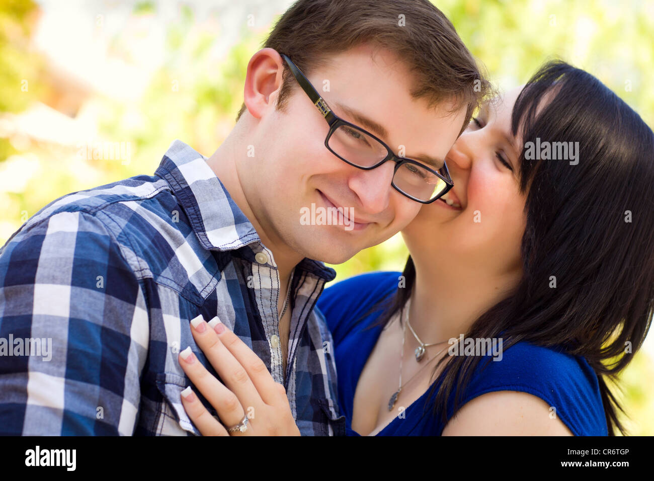 Attractive Young Couple Having Fun Outside in the Park Stock Photo - Alamy