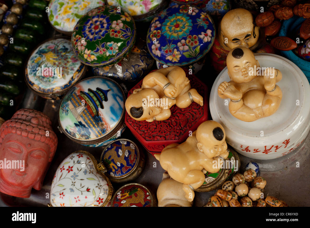 Old chinese culture Items sold in street stalls of China shanghai. Stock Photo