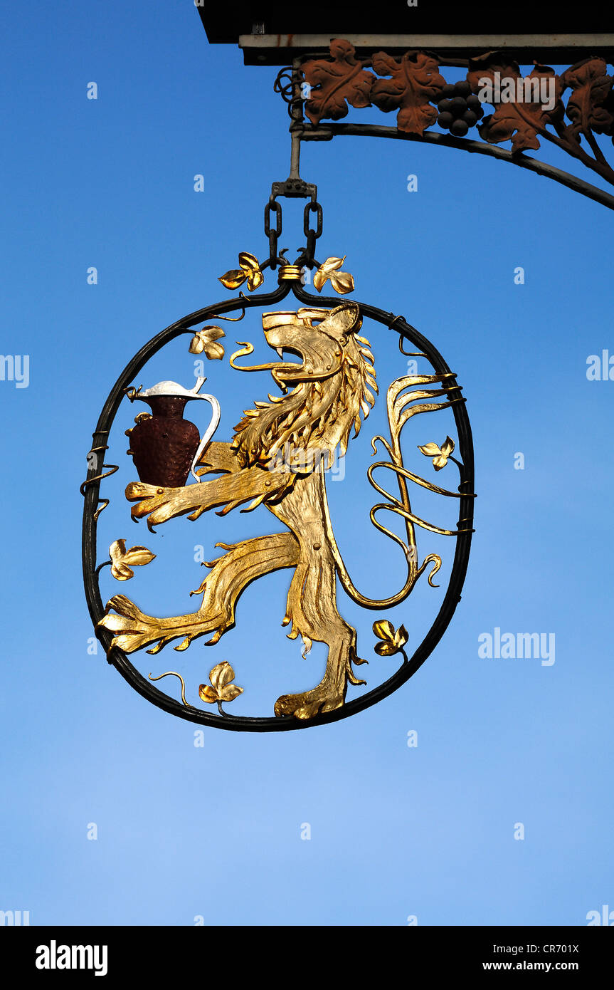 Gold-coloured lion as a hanging sign of the Residenz zum Loewen guesthouse, Oberthorstrasse, Lahr, Baden-Wuerttemberg Stock Photo