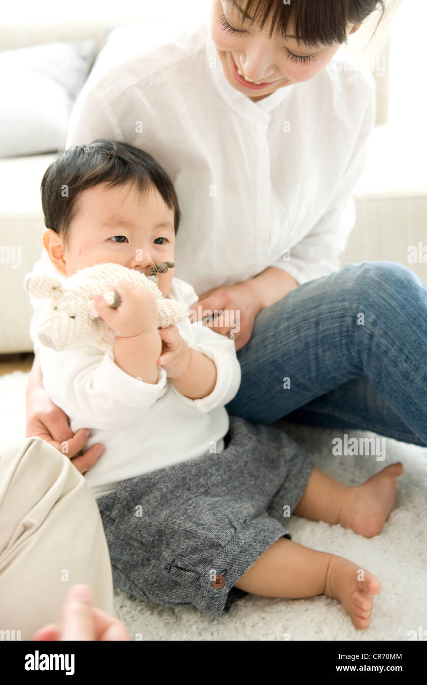 Boy sitting floor hi-res stock photography and images - Alamy