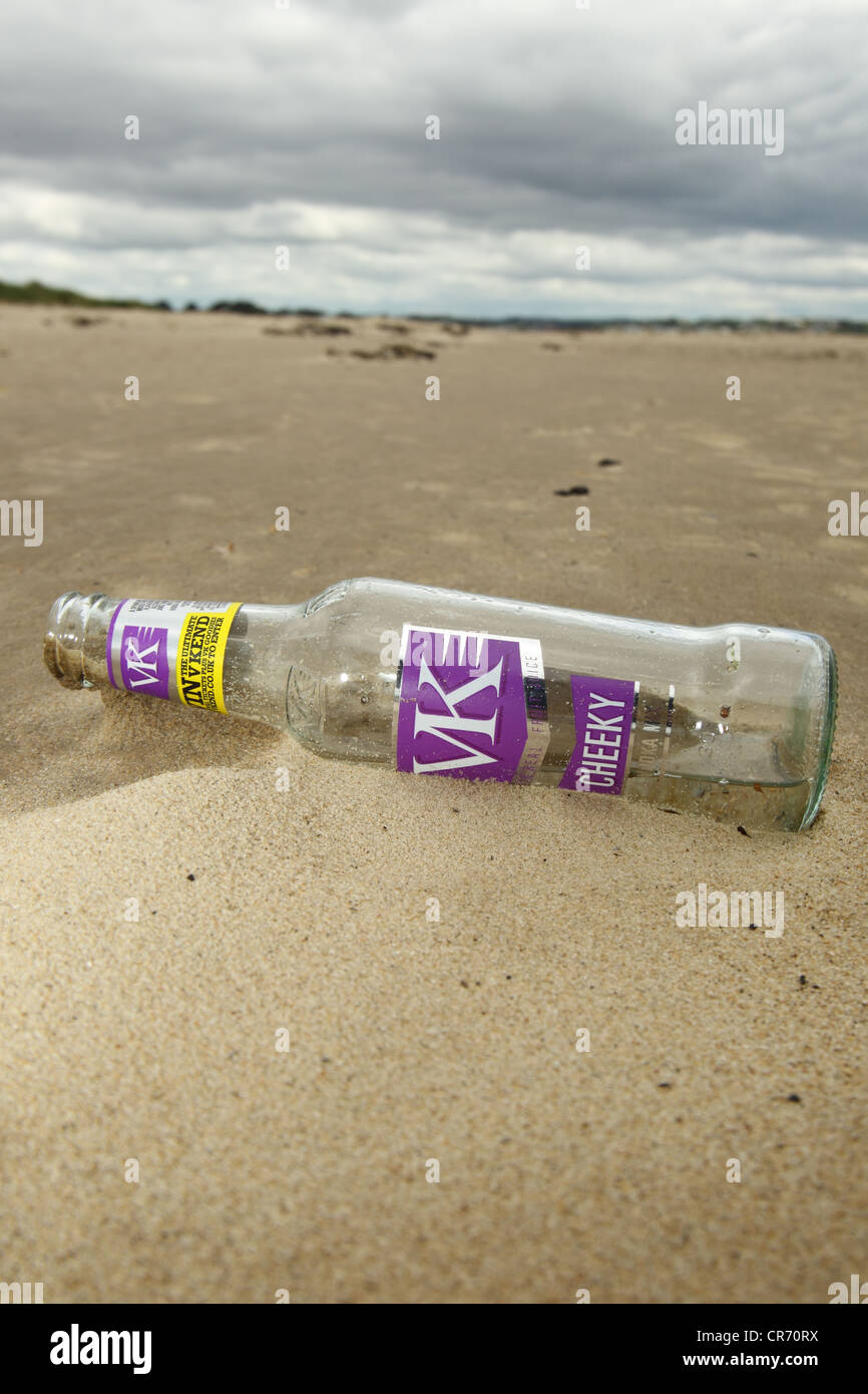 Glass bottle on beach, Studland Dorset, May. Stock Photo