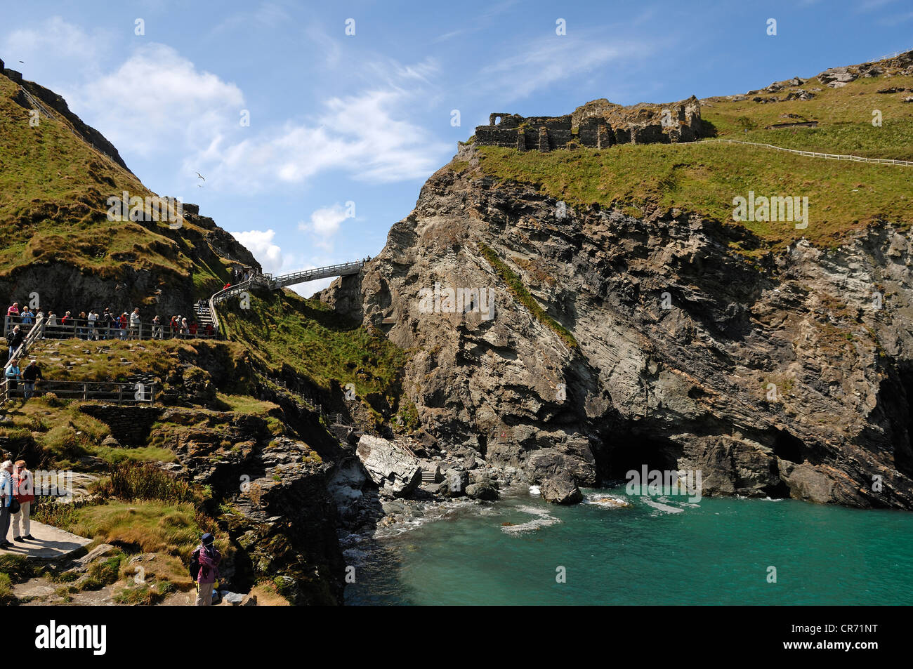 Rugged cliffs on the coast near Tintagel, Tintagel Castle on the cliff, a Celtic Early Christian monastery between the 5th and Stock Photo