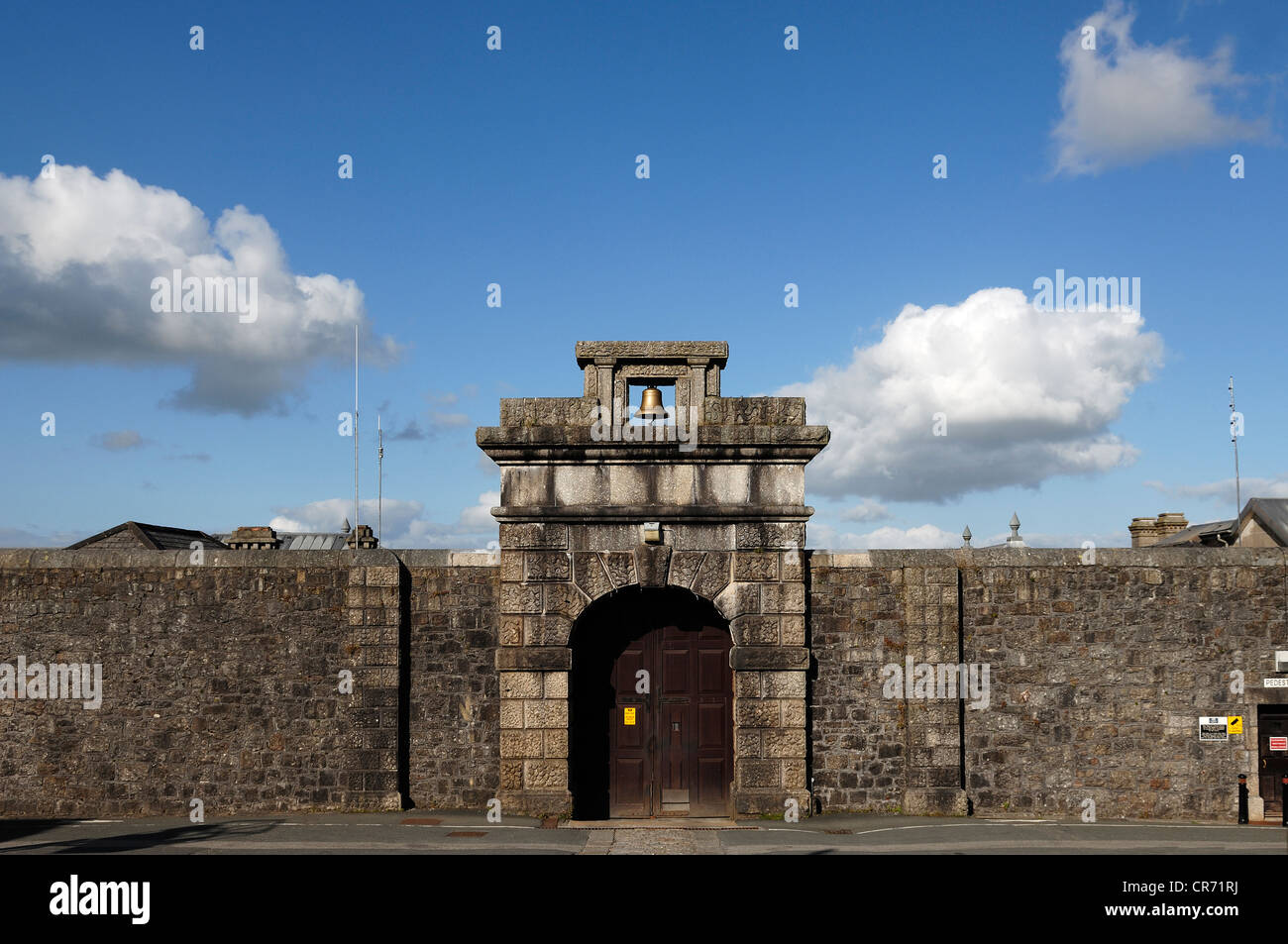 HM Prison Dartmoor, entrance gate with a bell, built between 1806 and 1809, Princetown, Dartmoor, Devon, England, United Kingdom Stock Photo