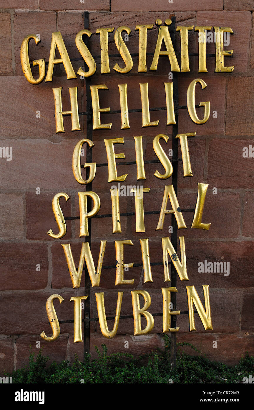 Gold-coloured lettering outside the Heiliggeist Spital Weinstuben restaurant, Spitalgasse 16, Nuremberg, Middle Franconia Stock Photo