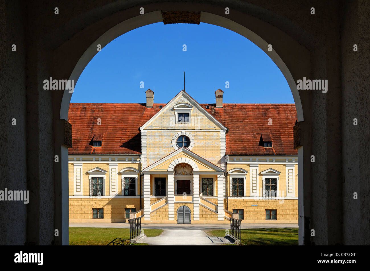 Entrance facade of Old Schleissheim Palace, 1617 - 1623, seen through an archway, Maximilianshof courtyard, Oberschleissheim Stock Photo