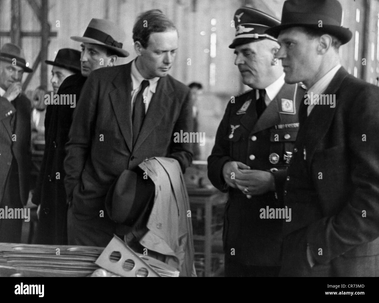 Lindbergh, Charles, 4.2.1902 - 26.8.1974, American aviator, visit to Germany, inspection of the Messerschmitt Works at Augsburg, 1938, in the assembly hall, with Willy Messerschmitt, staff engineer Wendland and Michel Detroyat, , Stock Photo